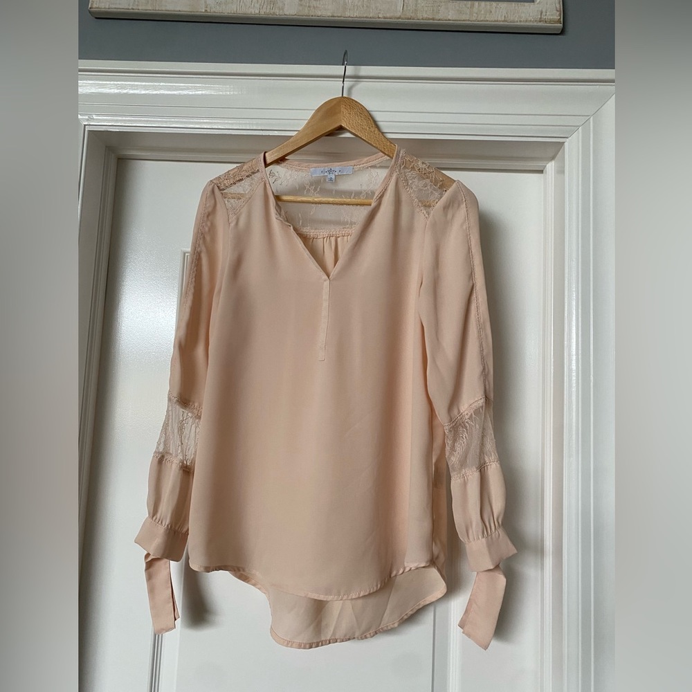 Women’s blouse with lace detail on sleeve size Medium